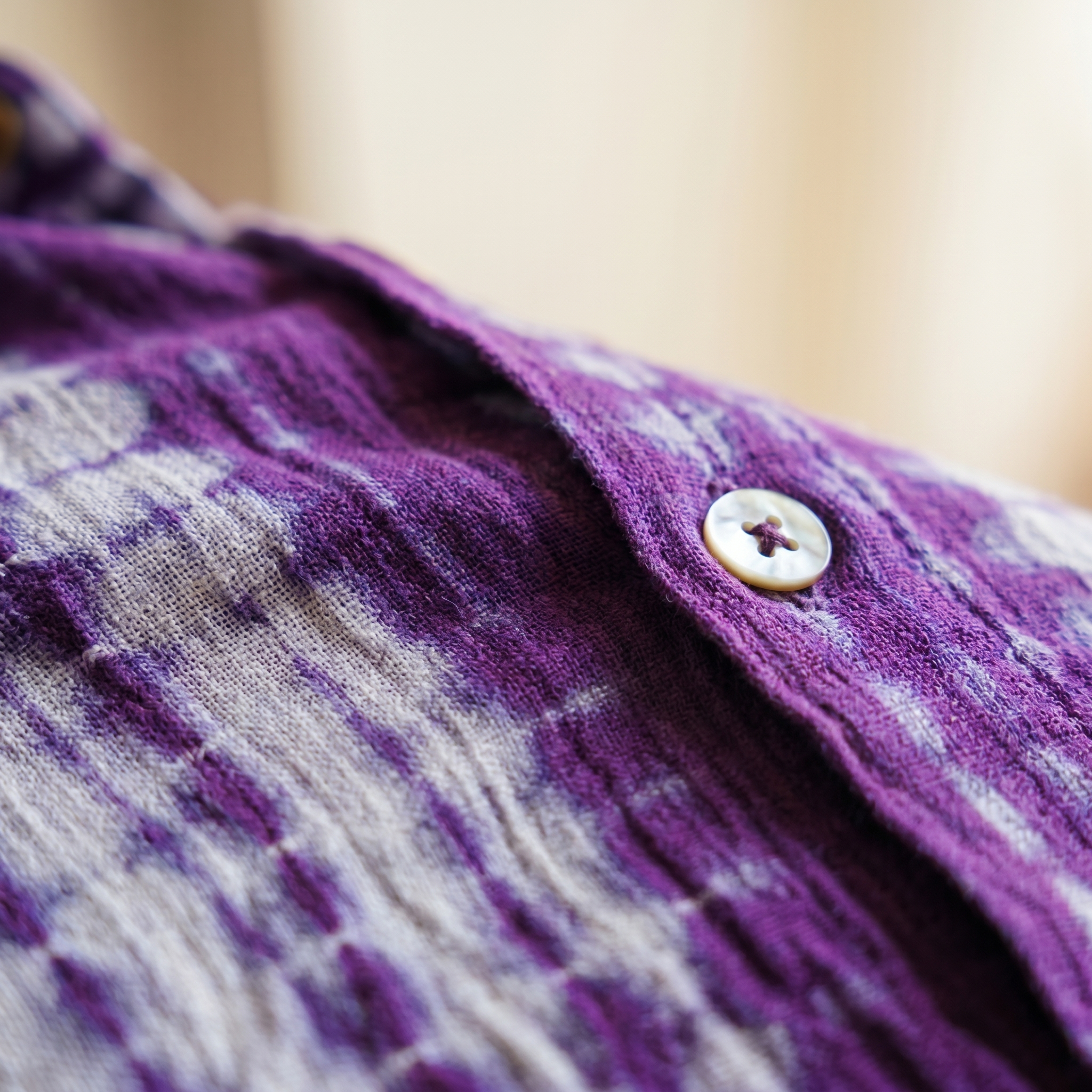 The Plum Shibori, close up of shibori folds and plum dye