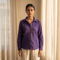 Woman wearing The Indigo Bandhani, deep indigo tie dot pattern