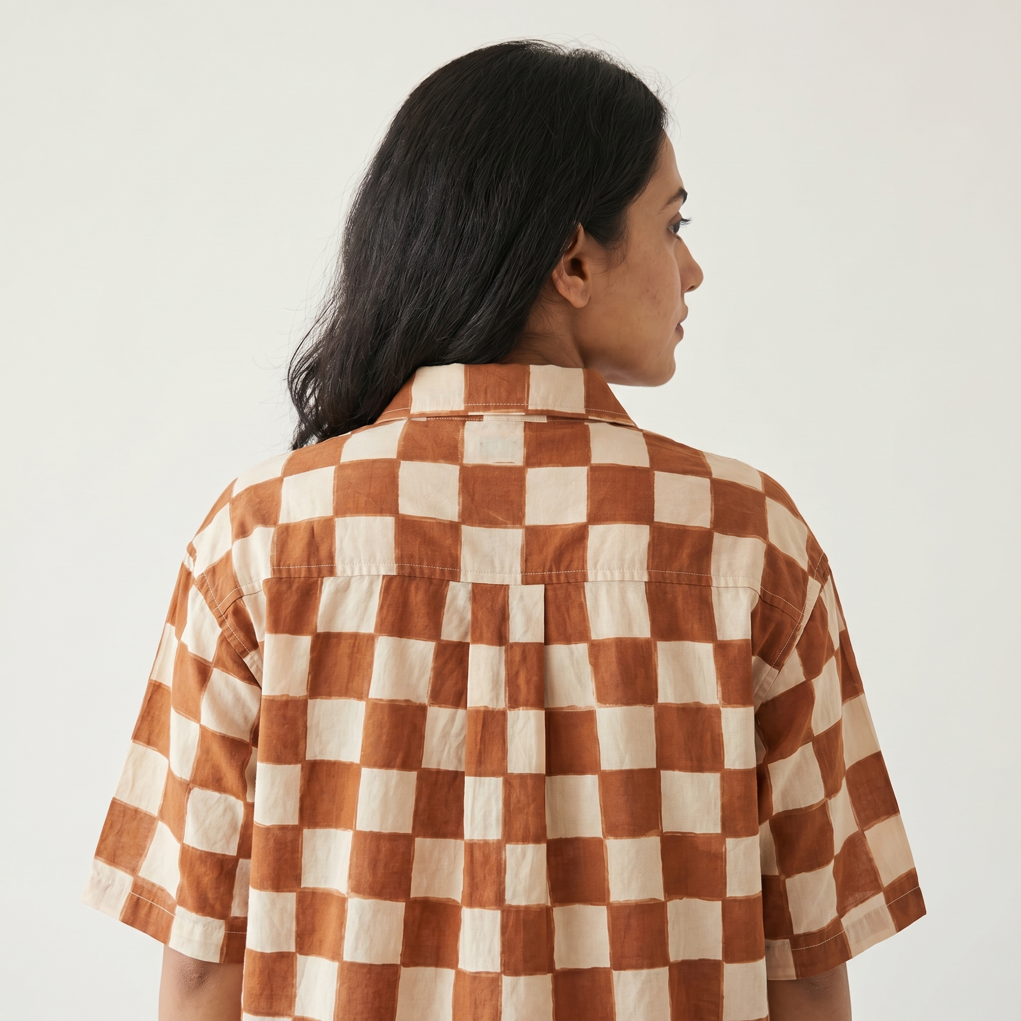 The Brown Checkerboard, back profile